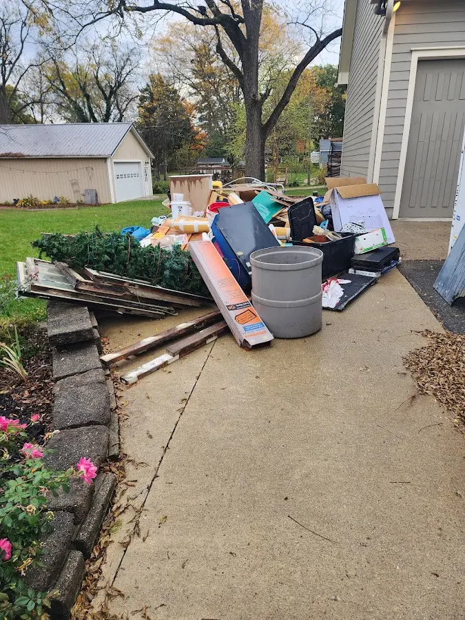 Dumpster being loaded with debris for Commercial Dumpster Rental in Tabernacle